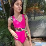 Entero con cinturón y faralado en hombro